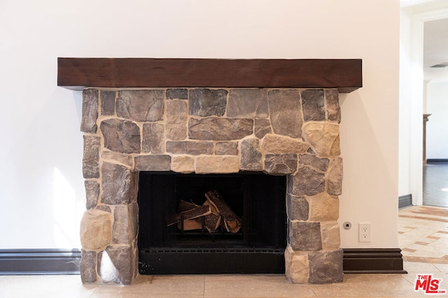 interior details featuring a fireplace