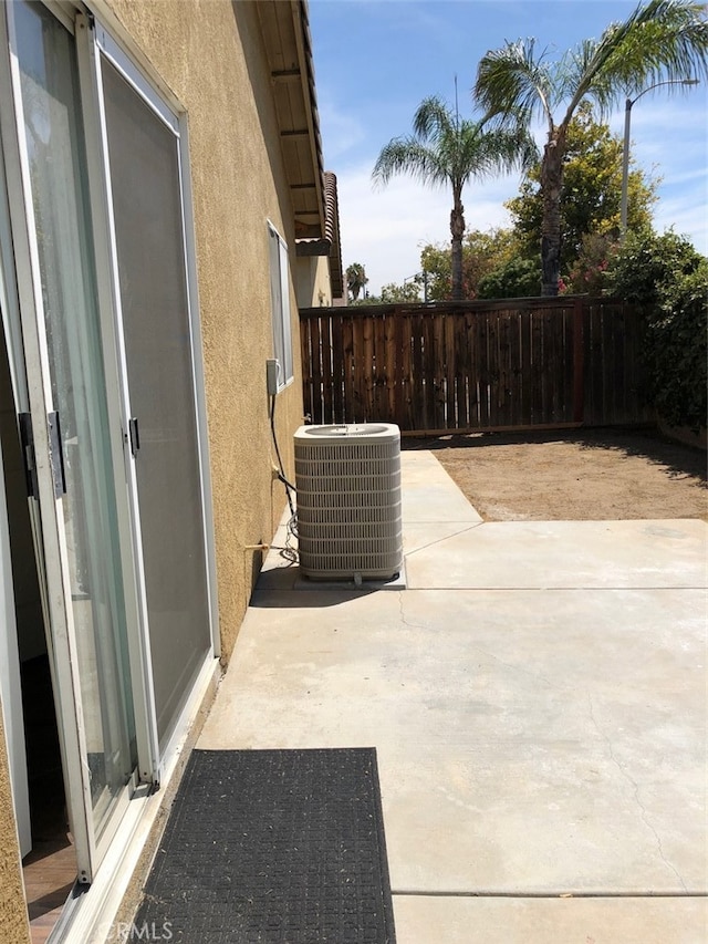 view of patio featuring cooling unit