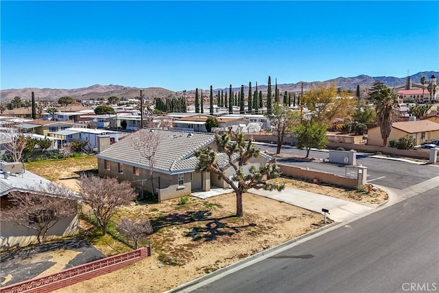 view of front of property with a mountain view