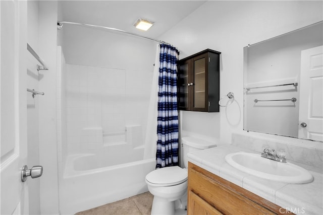 full bathroom featuring tile patterned flooring, shower / bath combo, vanity, and toilet