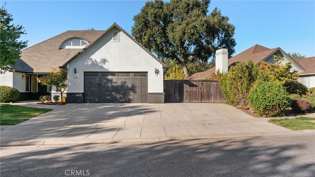 view of side of home featuring a garage