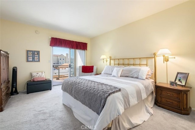 bedroom featuring light carpet