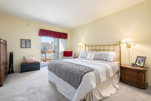 bedroom featuring light carpet