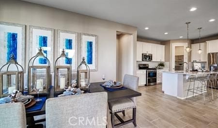 living room with light hardwood / wood-style flooring