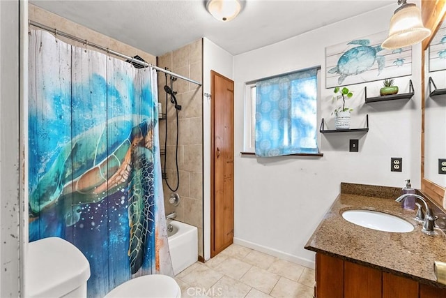 bathroom featuring vanity, toilet, shower / tub combo with curtain, tile patterned floors, and baseboards