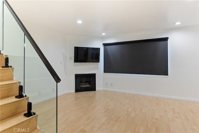 unfurnished living room with light hardwood / wood-style flooring