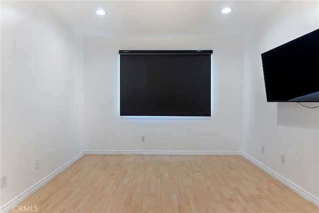 unfurnished room featuring light hardwood / wood-style floors