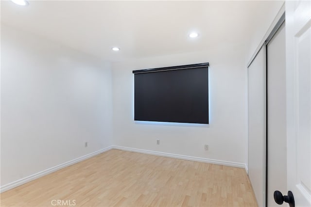 empty room featuring light hardwood / wood-style floors