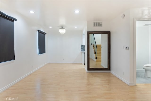 empty room with light wood-type flooring