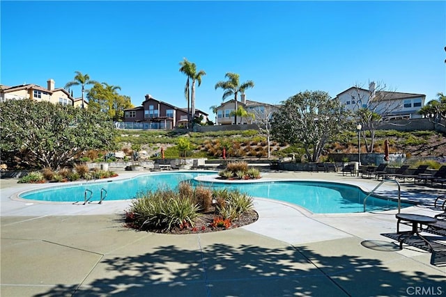 view of swimming pool featuring a patio