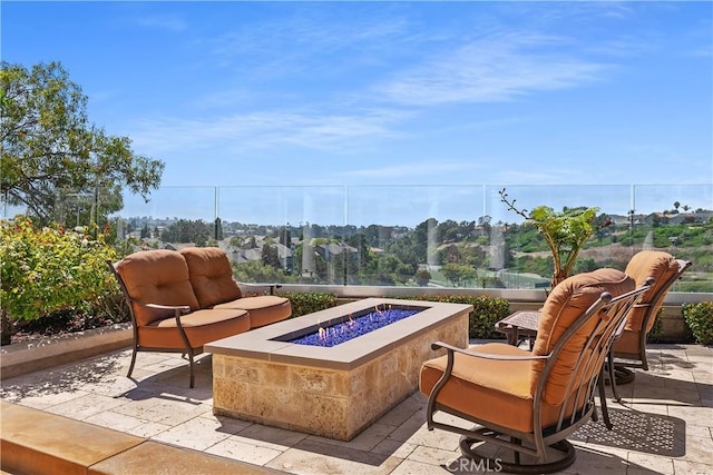 view of patio featuring a fire pit