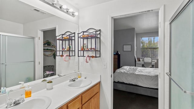 bathroom with walk in shower and vanity