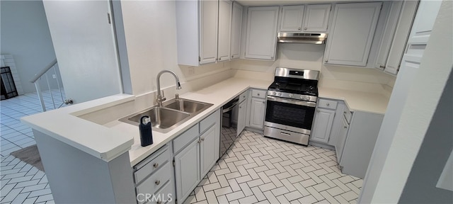 kitchen featuring light tile patterned floors, sink, stainless steel stove, dishwasher, and gray cabinets