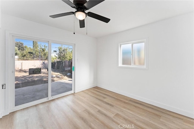 unfurnished room with ceiling fan and light hardwood / wood-style floors