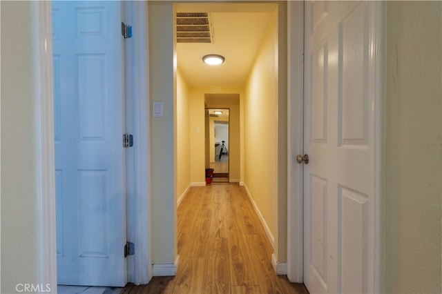 hall featuring light hardwood / wood-style flooring