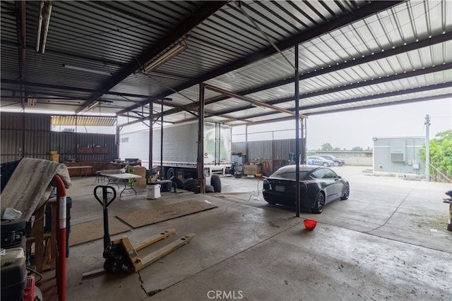 garage featuring a carport