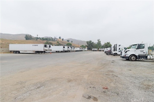3604 Campbell St, Jurupa Valley, CA 92509 - uncovered parking lot featuring a mountain view