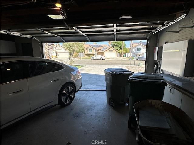 garage featuring a carport