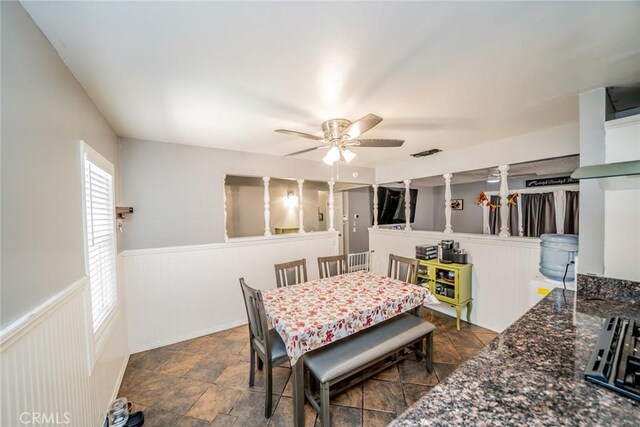 dining space with ceiling fan