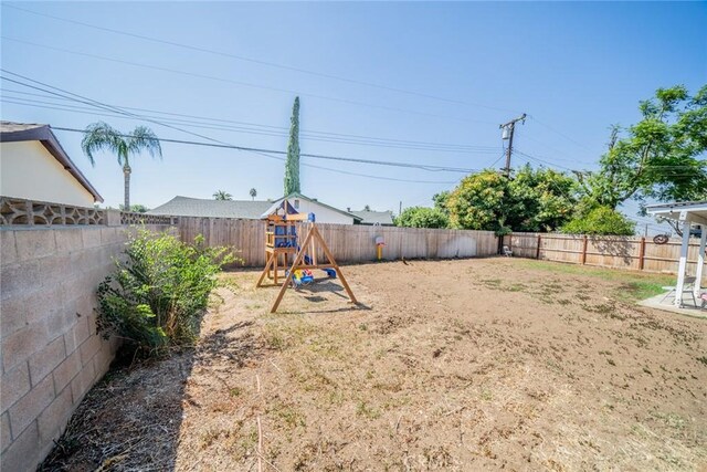 view of yard featuring a playground