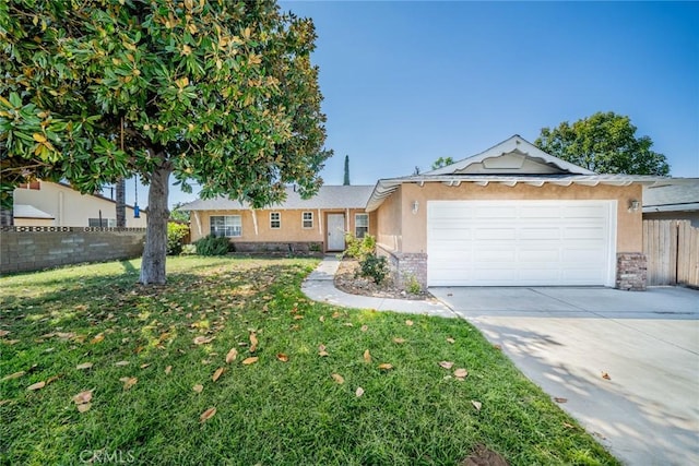 ranch-style home featuring a garage and a front lawn