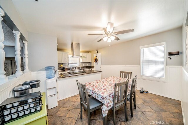 dining area featuring ceiling fan