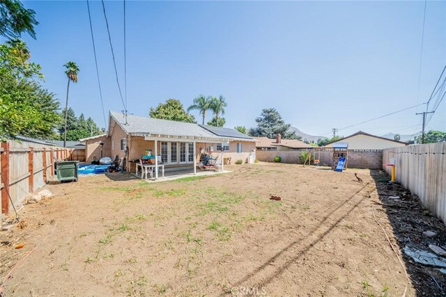 back of property with french doors