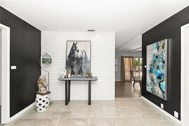 foyer entrance with light hardwood / wood-style flooring