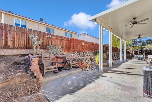 view of patio / terrace featuring central AC unit and ceiling fan