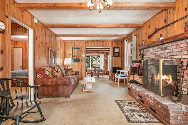 living room featuring a brick fireplace, wood walls, light carpet, and beam ceiling