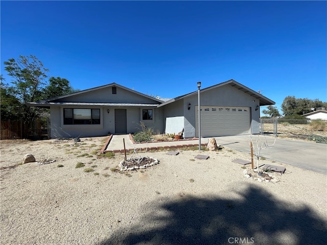 single story home with a garage