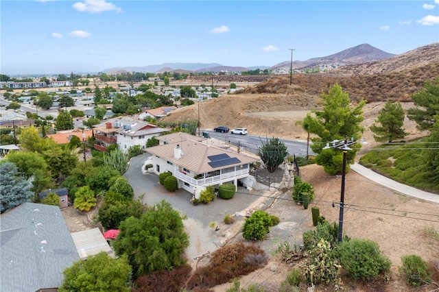 drone / aerial view featuring a mountain view