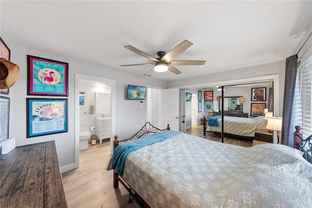 bedroom with ceiling fan, ensuite bathroom, a closet, and light hardwood / wood-style floors