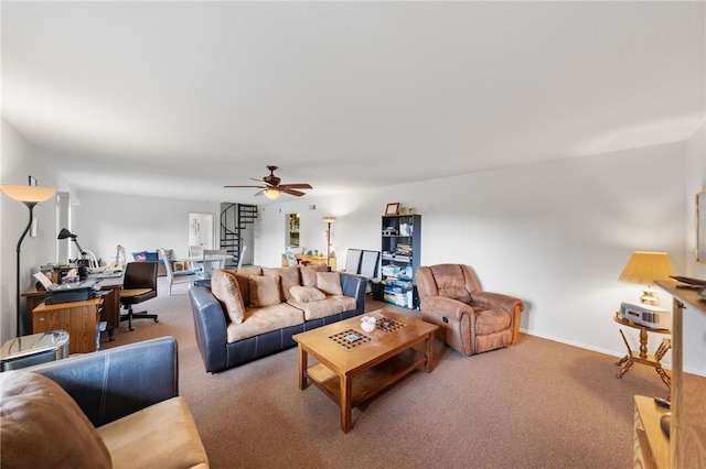 carpeted living room featuring ceiling fan