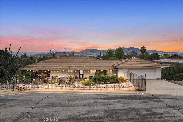 view of front of house featuring a mountain view