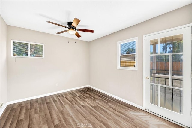 unfurnished room featuring wood-type flooring and ceiling fan