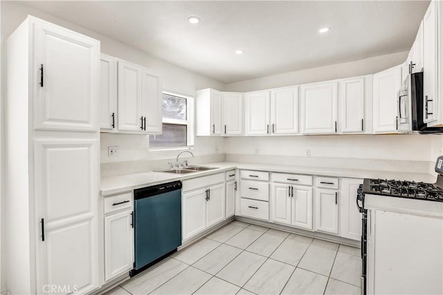 kitchen with white cabinetry, sink, light tile patterned floors, and appliances with stainless steel finishes