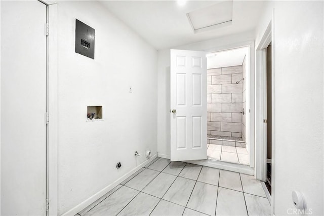 laundry room with gas dryer hookup, light tile patterned floors, and hookup for a washing machine