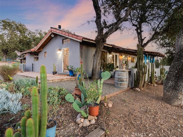 view of front of house with a patio area