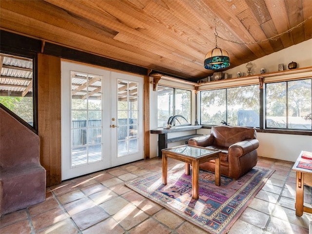 sunroom featuring french doors, vaulted ceiling, and wooden ceiling