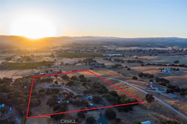 aerial view at dusk with a rural view