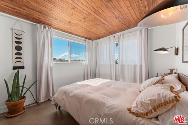 bedroom with wood ceiling