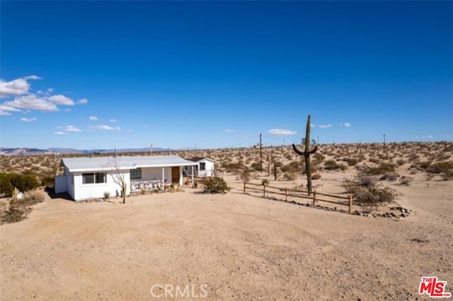 exterior space with a rural view