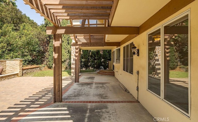 view of patio featuring a pergola