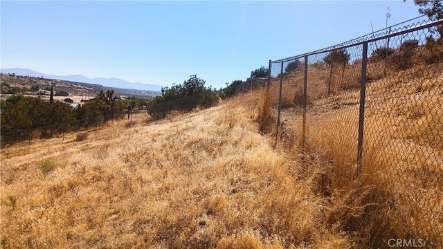 exterior space featuring a mountain view and a rural view