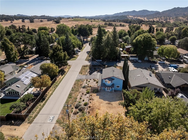 drone / aerial view featuring a mountain view