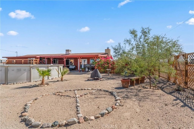 back of house with a patio area