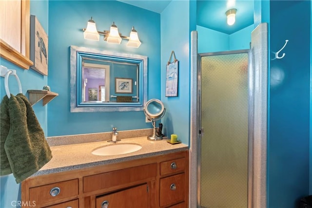 bathroom featuring vanity and walk in shower