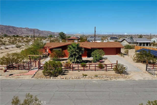 view of front of home with a mountain view