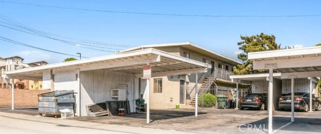 view of parking featuring a carport